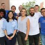 Group of graduate students from GRACE posing together outdoor on campus
