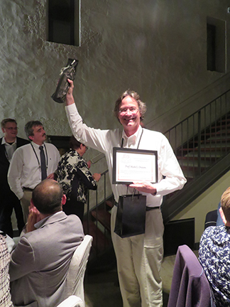 Mark responds to the audience after receiving the award.