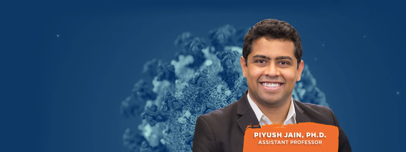 Headshot of Piyush Jain, Ph.D. on a blue background.