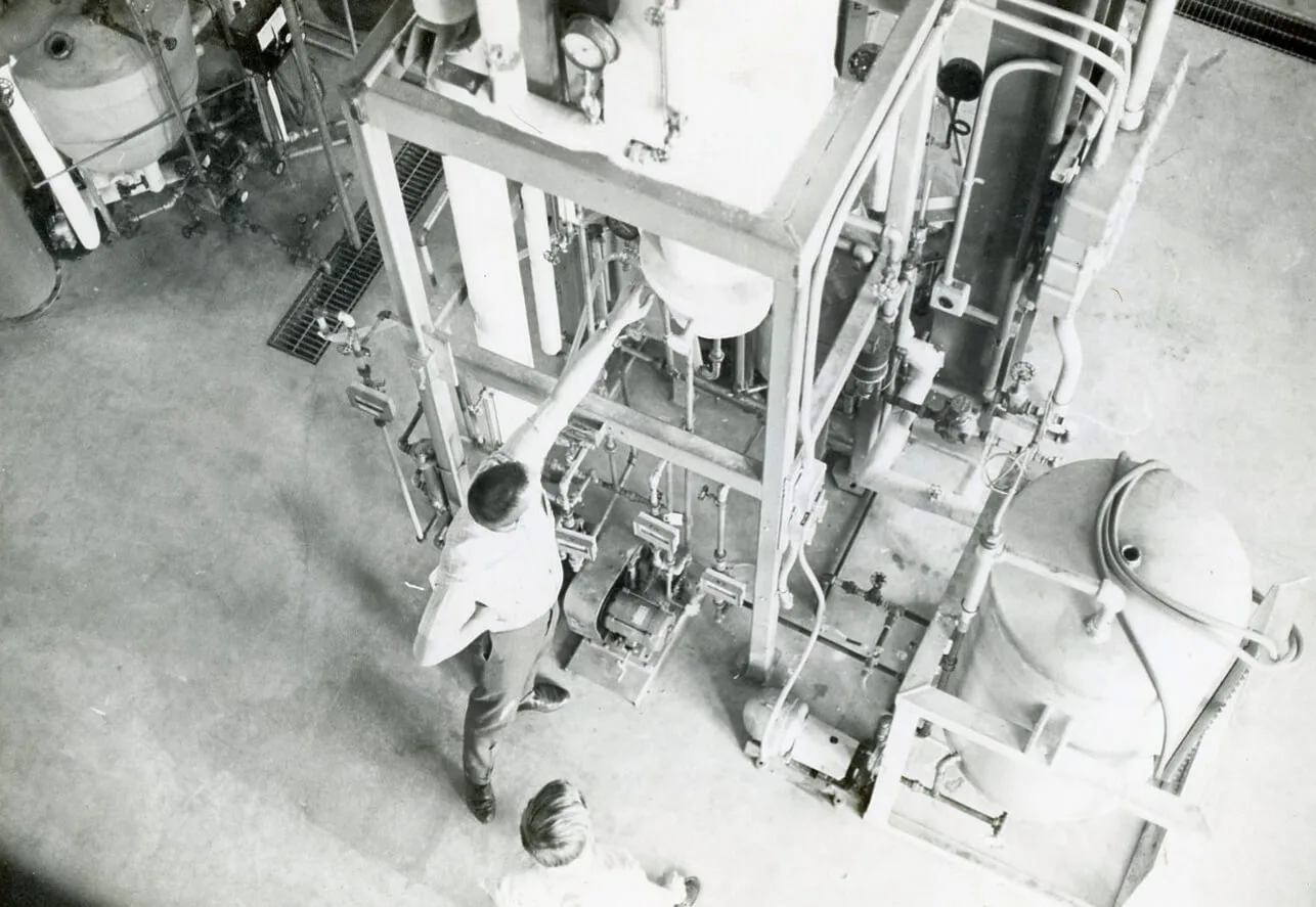 An image of the Units Ops Lab from the 1960s shot from above the distillation towers looking down.