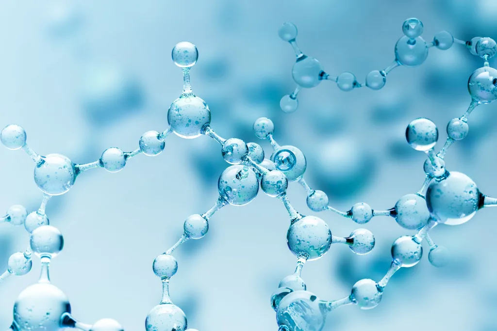 Abstract molecular structures with interconnected translucent blue spheres and bonds, representing polymers or membrane materials at the nanoscale.